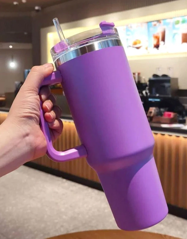 Trendy purple 40oz Quencher H2.0 Tumbler with straw, handle, and cup-holder friendly base